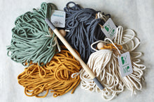 Load image into Gallery viewer, Macrame rope in four colours: eucalyptus, charcoal, mustard and natural cotton.

